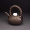 Teapot, c. 1995, glazed stoneware, 9 1/2 x 9 1/4 x 6 in., from the exhibit