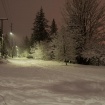 Snowy path at night
