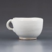 White teacup by Alisa Lau