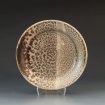 Plate with rake glaze fired to cone 10 by Jocelyn Purvis