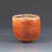 Orange shino teabowl by Megan Chow