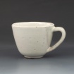 White cup with handle by Natalie Lewis