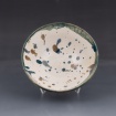 Bowl with glaze splatter by Neve Gelatt